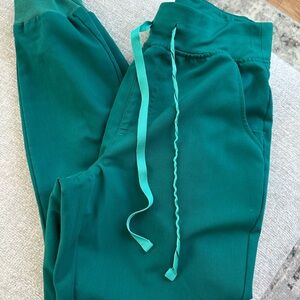 Figs high-wasted Zamora jogger scrub pants and Catarina one pocket scrub top